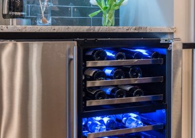 Close up of wine and beverage fridge in East Cobb kitchen remodel