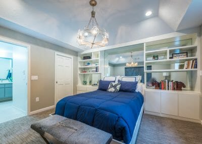 Bedroom with light fixture and coffered ceiling in Roswell master suite remodeling project