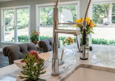 Restaurant-style faucet and farm sink in East Cobb kitchen remodeling project