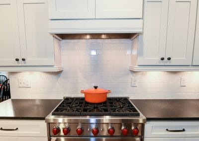 An enclosed vent hood in the East Cobb kitchen remodel