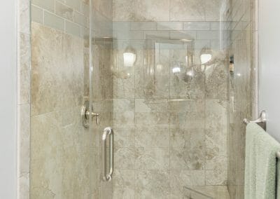 Glass door in the walk-in shower in master bath remodeling in Roswell