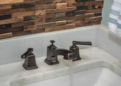 Rubbed bronze faucet in bathroom remodel in East Cobb