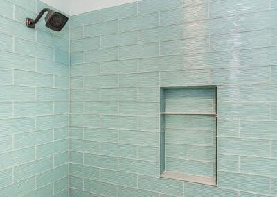 Sea-colored tile shower in nautical bath in East Cobb bathroom remodeling