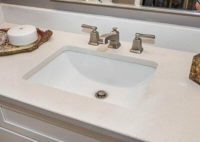 Off-white counter on vanity in Roswell bath remodel