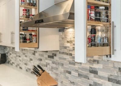 Pull-out hidden spice rack in kitchen remodeling project in Sandy Springs
