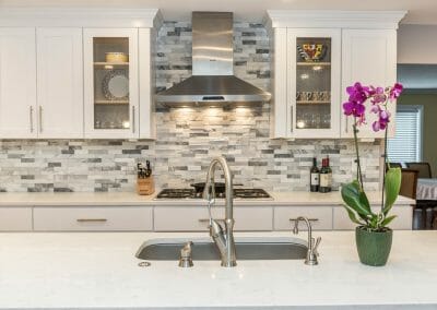 Stylish tile backsplash with white Shaker cabinets Sandy Springs kitchen remodeling project
