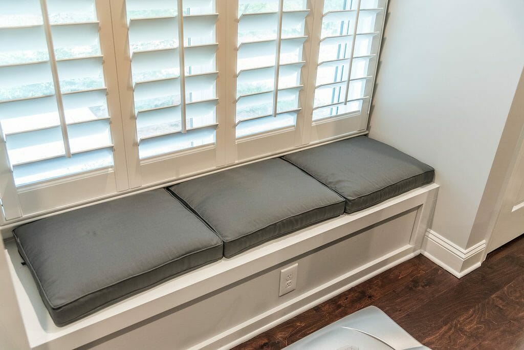 Window seat with storage in basement addition in East Cobb