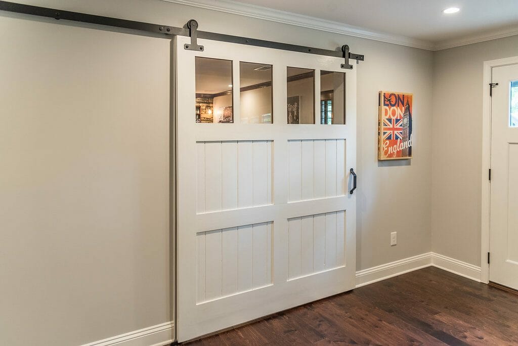 Separating the bar from the home theater in entertainment remodel in East Cobb