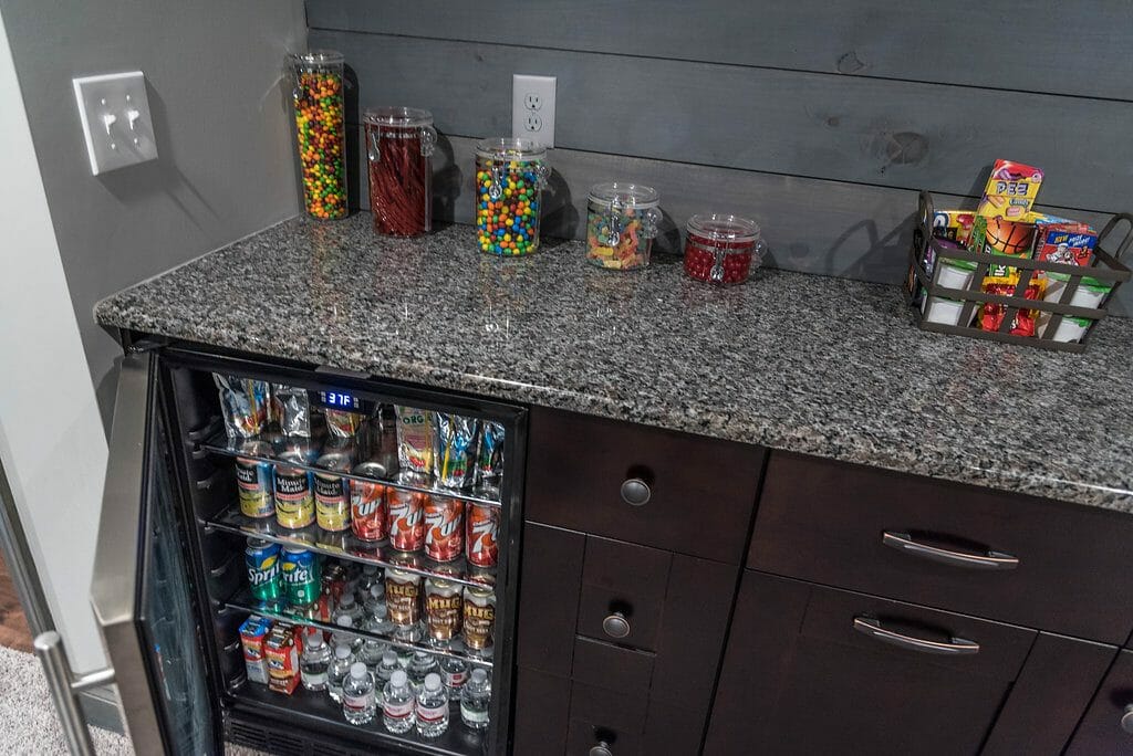 Beverage fridge in East Cobb home theater remodel