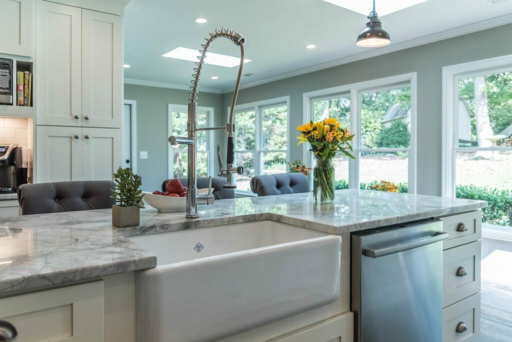 Farm sink and industrial style faucet in kitchen island in East Cobb kitchen remodel